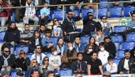 Soccer Football - Serie A - Lazio v Bologna - Stadio Olimpico, Rome, Italy - February 29, 2020 General view of fans wearing face masks in the stands due to the recent outbreak of coronavirus REUTERS/Alberto Lingria 