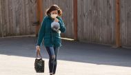 A woman leaves Life Care Center of Kirkland on February 29, 2020, in Kirkland, Washington. David Ryder/Getty Images/AFP