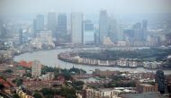 The Canary Wharf financial district is seen from the construction site of 22 Bishopsgate in London, Britain June 25, 2019. Reuters/Hannah McKay