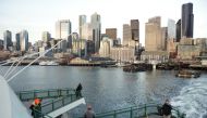 Passengers on a Washington State Ferry after officials released a statement asking riders driving aboard to consider staying in their vehicles and taking other steps to minimize coronavirus exposure in Seattle, Washington, US. March 4, 2020. Reuters/Jason