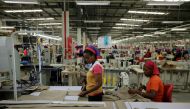 Workers arrange pieces of fabric inside the Indochine Apparel PLC textile factory in Ethiopia November 17, 2017. Reuters / Tiksa Neger