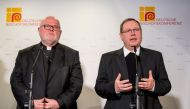 German Cardinal Reinhard Marx (L) and Limburg's Bishop Georg Baetzing, who was elected Marx' successor as leader of the German Bishops' Conference, address a press conference on March 3, 2020 during an episcopal gathering in Mainz, western Germany. AFP / 