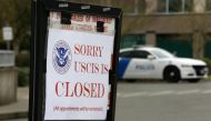A sign indicating the office is closed is posted following a two-week closure of a Department of Homeland Security building and US Citizenship and Immigration Services field office because of an employee who may be infected with the novel coronavirus in T