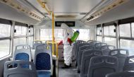A staff member at city transport company wearing protective clothing disinfects a bus as new coronavirus disease (COVID-19) cases are reported in Skopje, North Macedonia March 7, 2020.REUTERS/Ognen Teofilovski