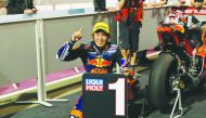 : Japanese rider Tetsuta Nagashima of Red Bull KTM Ajo celebrates after winning the Moto2 race of the Grand Prix of Qatar 2020.
