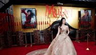 Cast member Liu Yifei poses at the premiere for the film 