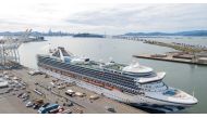 Tents begin to appear as workers tend to passengers disembarkingf from the Grand Princess cruise ship at the Port of Oakland in California on March 09, 2020. The cruise ship carrying thousands of people who were stranded for days due to a coronavirus outb