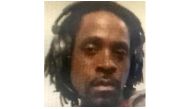 This undated photo provided by the Fresno Police Department shows Kori Ali Muhammad, 39, who was arrested shortly after a shooting outside a Catholic Charities building in Fresno.

