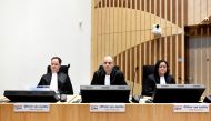 Prosecutors Thijs Berger, Ward Ferdinandusse and Dedy Woei-a-Tsoi attend the criminal trial against four suspects in the July 2014 downing of Malaysia Airlines flight MH17, in Badhoevedorp, Netherlands, March 10, 2020. Reuters/Piroschka Van De Wouw 