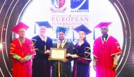 Mohamed Althaf, Director of Lulu Hypermarkets, receiving the doctoral certificate during a ceremony in Paris, France.