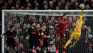 Atletico Madrid's Slovenian goalkeeper Jan Oblak clears the ball during the UEFA Champions league Round of 16 second leg football match between Liverpool and Atletico Madrid at Anfield in Liverpool, north west England on March 11, 2020. / AFP / JAVIER SOR