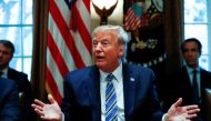 FILE PHOTO: U.S. President Donald Trump delivers remarks to the news media during a meeting with bankers on COVID-19 coronavirus response, inside the Cabinet Room at the White House in Washington, U.S., March 11, 2020. REUTERS/Tom Brenner