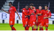 Al Duhail’s Brazilian striker Paulo Edmilson (second left) celebrates with team-mates after scoring a goal against Al Sailiya yesterday.