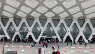 Tourists wait to be repatriated to their countries as Morocco suspends flights to European countries over coronavirus disease (COVID-19) fears, at Marrakech airport, Morocco, March 15, 2020. REUTERS/Youssef Boudlal