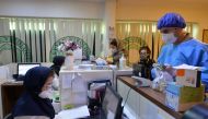 TEHRAN, IRAN - MARCH 10: Medical staffs work at Keyvan Virology Laboratory to confirm the coronavirus cases in Tehran, Iran on March 10, 2020. The death toll from the coronavirus outbreak in Iran rose to 291, local media reported on Tuesday. ( Fatemeh Bah