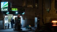 A petrol station in the Pigalle area after all non-essential public places including restaurants and cafes have been shut as a precaution to contain the spread of the COVID-19, caused by the novel coronavirus. AFP / JOEL SAGET