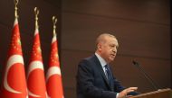President of Turkey Recep Tayyip Erdogan delivers a speech after coordination meeting of fight against coronavirus at Cankaya Palace in Ankara, Turkey on March 18, 2020. Murat Cetinmuhurdar - Anadolu 