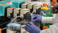 A scientist conducts research on a vaccine for the novel coronavirus (COVID-19) at the laboratories of RNA medicines company Arcturus Therapeutics in San Diego, California, U.S., March 17, 2020. REUTERS/Bing Guan