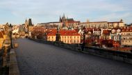 FILE PHOTO: An empty medieval Charles Bridge is seen in Prague, as the Czech government restricts movement of people to slow the spread of the new coronavirus disease (COVID-19), Czech Republic, March 16, 2020. REUTERS/David W Cerny/File Photo