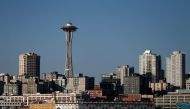 The Space Needle and the Seattle waterfront is seen from Elliott Bay during the outbreak of coronavirus disease (COVID-19) in Seattle, Washington, U.S. March 18, 2020. Picture taken March 18, 2020. REUTERS/Lindsey Wasson
