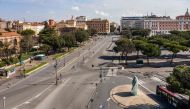 A morning aerial photo taken on March 30, 2020 shows a deserted Via Enrico de Nicola and a statue of late Pope Johan Paul II (Bottom R) near the Termini railway station in Rome during the country's lockdown aimed at curbing the spread of the COVID-19 infe