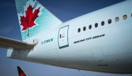  In this file photo taken on August 6, 2018 Air Canada planes sit on the tarmac of Roissy-Charles de Gaulle Airport, north of Paris. AFP / Joel Saget
 