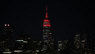 NEW YORK, USA - APRIL 1: Empire State Building lights up like an ambulance to honour emergency healthcare workers responding to the new type of coronavirus (COVID-19) pandemic in New York City, United States on April 1, 2020. ( Tayfun Co?kun - Anadolu Age