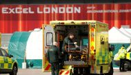 Medical staff prepare a ambulance at NHS Nightingale hospital as the spread of the coronavirus disease (COVID-19) continues, London, Britain, April 2, 2020. REUTERS/John Sibley