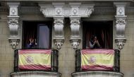People confined in their homes applaud from their balconies in support of healthcare workers during the lockdown amid the coronavirus disease (COVID-19) outbreak in Madrid, Spain, April 4, 2020. REUTERS/Juan Medina
