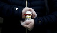 Laura Ng, who has lupus and had to recently call at least five pharmacies before she could find a place to fill her hydroxychloroquine prescription, is photographed in Seattle, Washington, U.S. March 31, 2020. Reuters/Lindsey Wasson