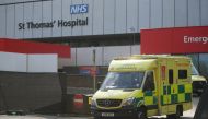 An ambulance leaves St Thomas' Hospital in central London on April 7, 2020, where Britain's Prime Minister Boris Johnson is in intensive care with symptoms of the novel coronavirus COVID-19.  / AFP / Isabel Infantes