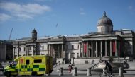 An ambulance is seen in Trafalgar Square in London, as the spread of the coronavirus disease (COVID-19) continues, London, Britain, April 13, 2020. REUTERS/Hannah McKay
