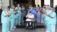 TOPSHOT - Brazilian 99-year-old former WWII combatant Ermando Armelino Piveta, gestures as leaves the Armed Forces Hospital in Brasilia, after being treated for the novel coronavirus COVID-19 and discharged, on April 14, 2020. / AFP / EVARISTO SA