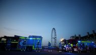Firefighters applaud on Westminster bridge during the Clap for our Carers campaign in support of the NHS as the spread of the coronavirus disease (COVID-19) continues, London, Britain, April 9, 2020. REUTERS/Hannah McKay