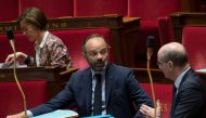 French Prime Minister Edouard Philippe speaks with French Education and Youth Affairs Minister Jean-Michel Blanquer during a session of questions to the government at the national Assembly in Paris, on April 21, 2020. / AFP / POOL / Jacques Witt