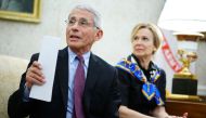 Dr. Anthony Fauci (L), director of the National Institute of Allergy and Infectious Diseases speaks next to Response coordinator for White House Coronavirus Task Force Deborah Birx, during a meeting with US President Donald Trump and Louisiana Governor Jo