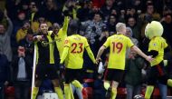 Watford's Troy Deeney celebrates scoring their third goal with teammates REUTERS/David Klein EDITORIAL