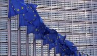 European Union flags fly outside the European Commission headquarters in Brussels, Belgium, February 19, 2020. Picture taken February 19, 2020 Reuters/Yves Herman/File Photo