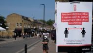 A social distancing sign is seen on Broadway Market, following the outbreak of the coronavirus disease (COVID-19), London, Britain, May 9, 2020. REUTERS/John Sibley