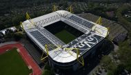 This aerial view shows the Signal Iduna Park of the Bundesliga club Borussia Dortmund in Dortmund, western Germany, on May 8, 2020. / AFP / Ina FASSBENDER