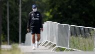 FC Schalke 04's German headcoach David Wagner walks with a face mask at the club's training grounds before a training session in Gelsenkirchen, western Germany on May 14, 2020. AFP / Ina FASSBENDER

