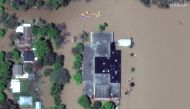 A satellite image shows a flooded Windover High School after rising floodwaters unleashed by two dam failures submerged parts of Midland, Michigan, U.S. May 20, 2020. Satellite image ?2020 Maxar Technologies/Handout via REUTERS 

