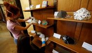 Workers prepare a face mask exhibition at the National Museum amid the coronavirus disease (COVID-19) outbreak in Prague, Czech Republic, May 21, 2020. REUTERS/David W Cerny