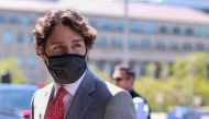 (FILES) In this file photo Canadian Prime Minister Justin Trudeau arrives on Parliament Hill to attend a sitting of the Special Committee on the COVID-19 Pandemic, May 20, 2020 in Ottawa, Canada. / AFP / Dave Chan
