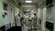 MOSCOW, RUSSIA - MAY 22: Healthcare workers wearing protective suit are seen on their duty a state hospital in Moscow, Russia on May 22, 2020. Russia remains second-worst-hit country globally, with 326,448 coronavirus cases. ( Sefa Karacan - Anadolu Agenc