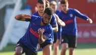 A handout picture released by the Atletico Madrid football club on May 25, 2020 shows players during a training session at the Majadahonda Training Complex. (AFP PHOTO / ATLETICO MADRID HANDOUT)
