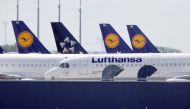 FILE PHOTO: Airplanes of German carrier Lufthansa at the Berlin Schoenefeld airport, Germany, May 26, 2020. REUTERS/Fabrizio Bensch