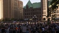 MINNEAPOLIS, MN - MAY 28: A large group of protesters gathers outside the Hennepin County Government Center on May 28, 2020 in Minneapolis, Minnesota. Police and protesters continued to clash for a third night after George Floyd was killed in police custo