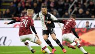 Juventus' Cristiano Ronaldo in action with AC Milan's Davide Calabria and Simon Kjaer REUTERS/Alberto Lingria/File Photo