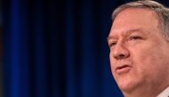 In this file photo US Secretary of State Mike Pompeo speaks to the press at the State Department in Washington, DC, on May 20, 2020. AFP / POOL / NICHOLAS KAMM